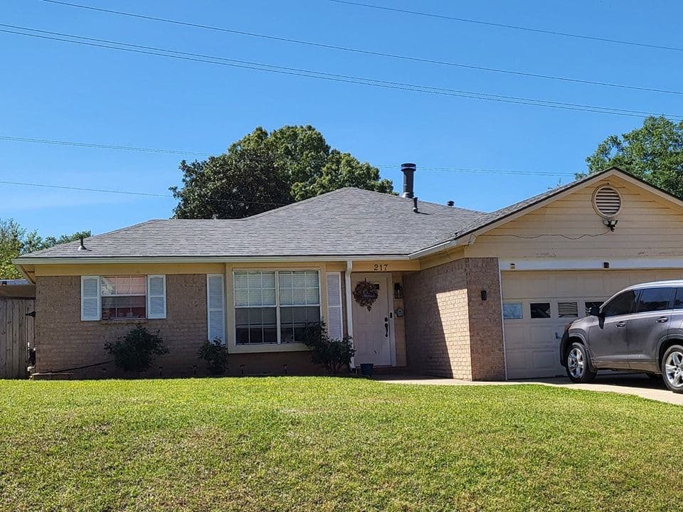 Blog post How to Deal With Roof Damage After a Storm image