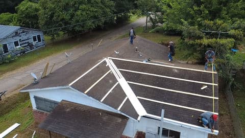 Transforming Shingle Roof with Sleek Metal Finish image