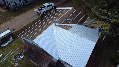 Gallery photos for Transforming Shingle Roof with Sleek Metal Finish: Image #1
