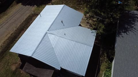 Gallery photos for Transforming Shingle Roof with Sleek Metal Finish: Image #2